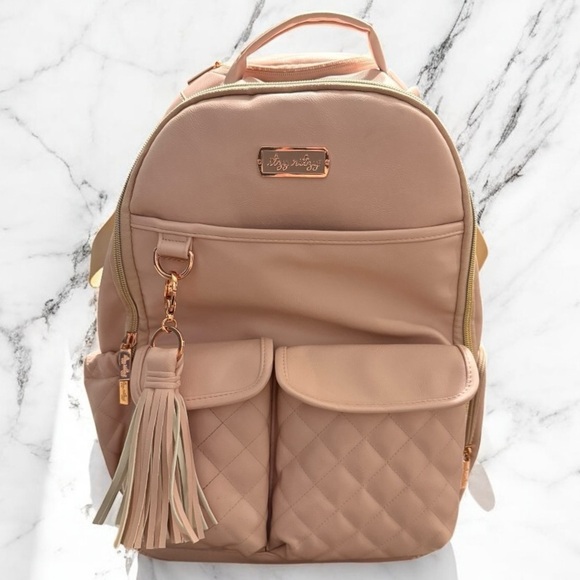 Itzy Ritzy Handbags - Itzy Ritzy Boss Baby Backpack Diaper Bag Blush Vegan Leather Changing Pad